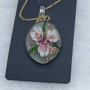 Floral art glass pendant on a 925 plated gold chain.